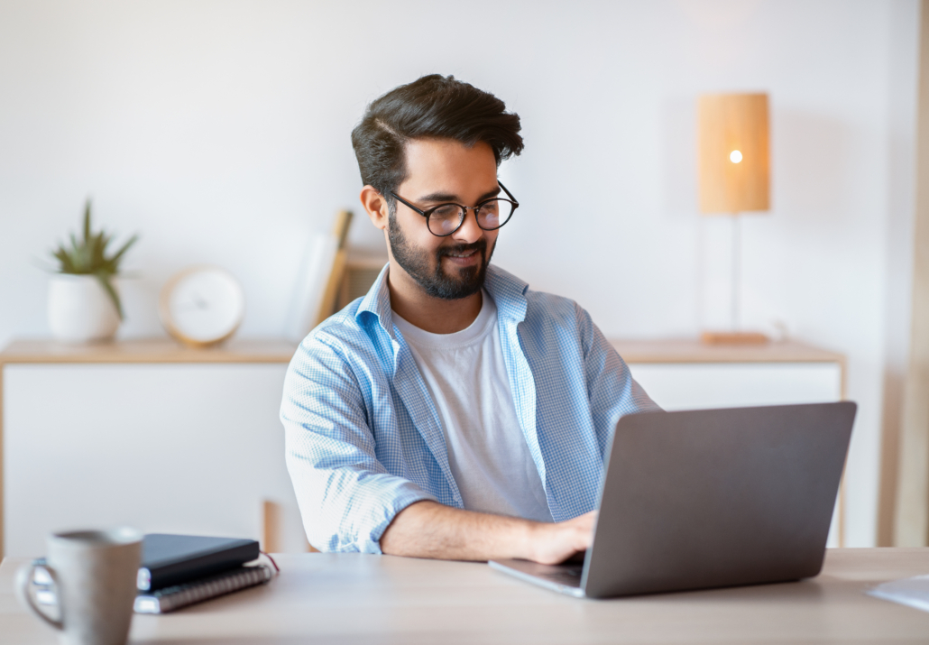 RCFE professional on a laptop working on their marketing